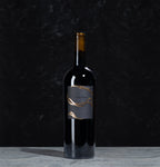 Thorn Merlot bottle of wine on a black background