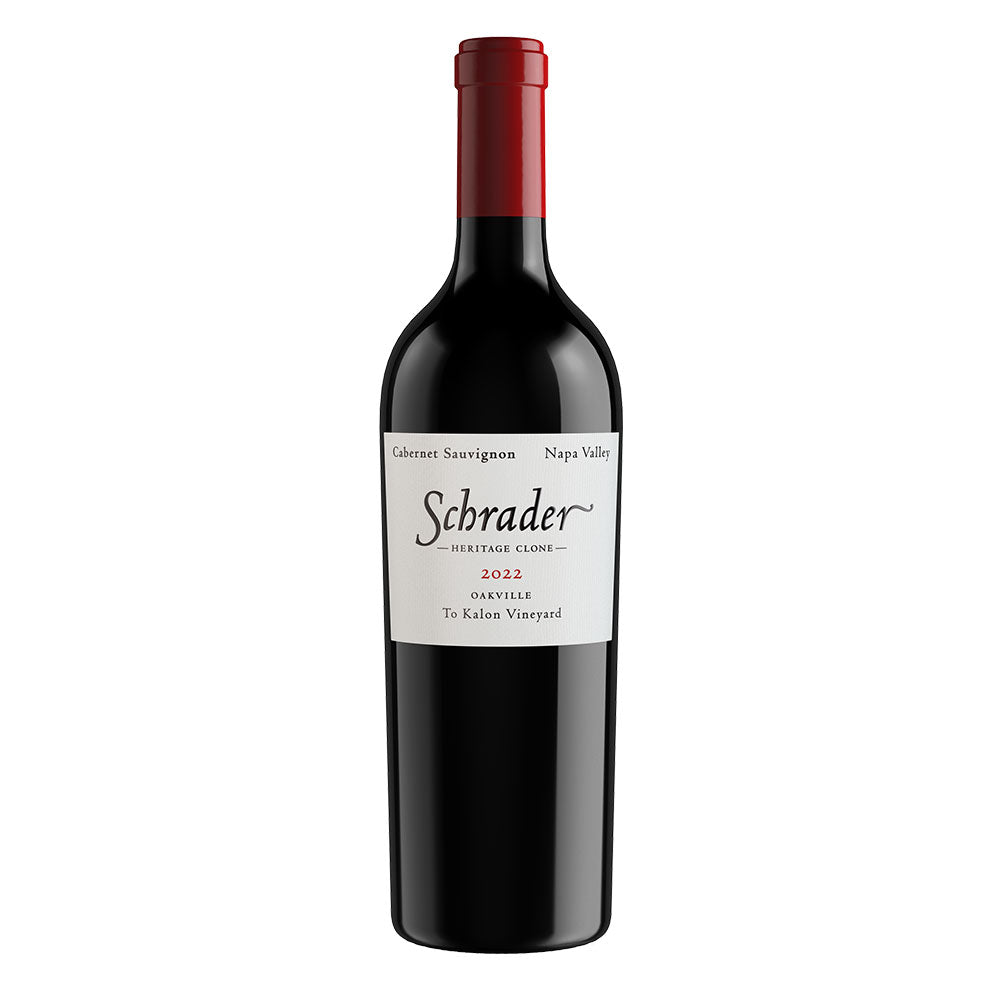 A bottle of Schrader Heritage Clone 2022 Cabernet Sauvignon from the To Kalon Vineyard, featuring a dark glass bottle, a red foil capsule, and a white label with black text.