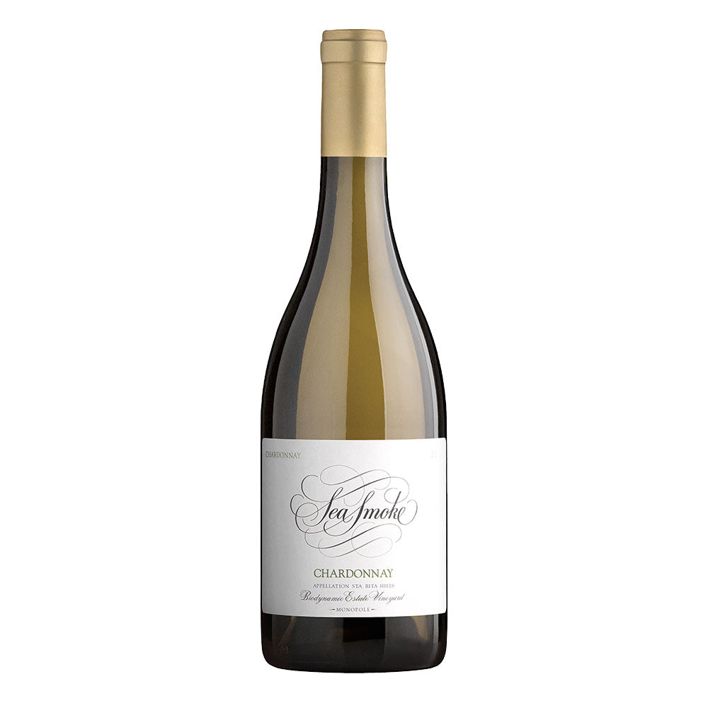 A bottle of Sea Smoke Chardonnay white wine, featuring a dark glass bottle with a gold foil capsule and a white label with elegant black script, set against a plain white background.