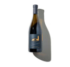 A bottle of The Estates Chardonnay Carneros Napa Valley on a white background.
