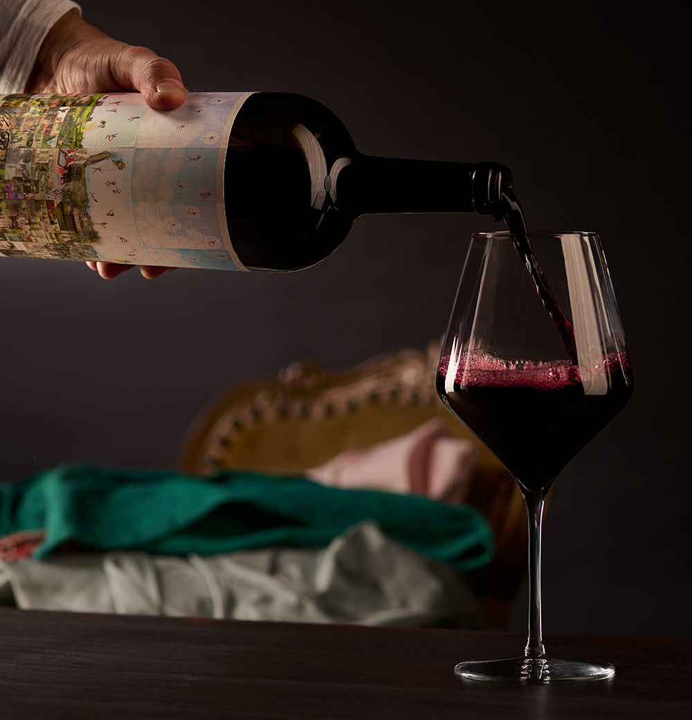 the prisoner corrections red blend magnum pouring into a glass of wine