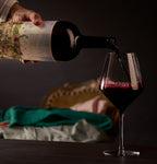 the prisoner corrections red blend magnum pouring into a glass of wine
